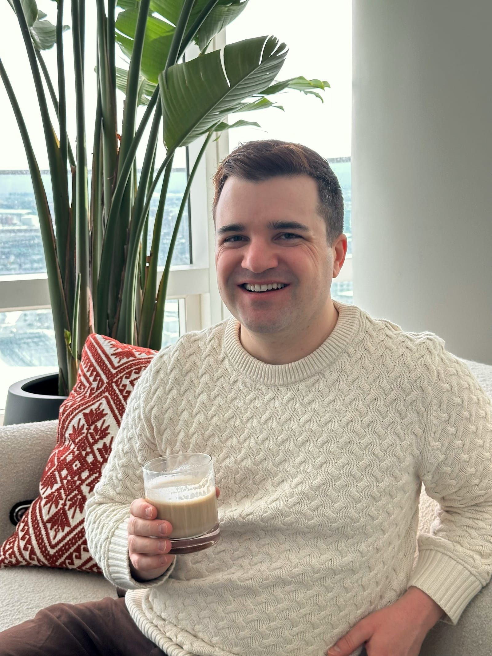 Brett Wharton, seated with coffee